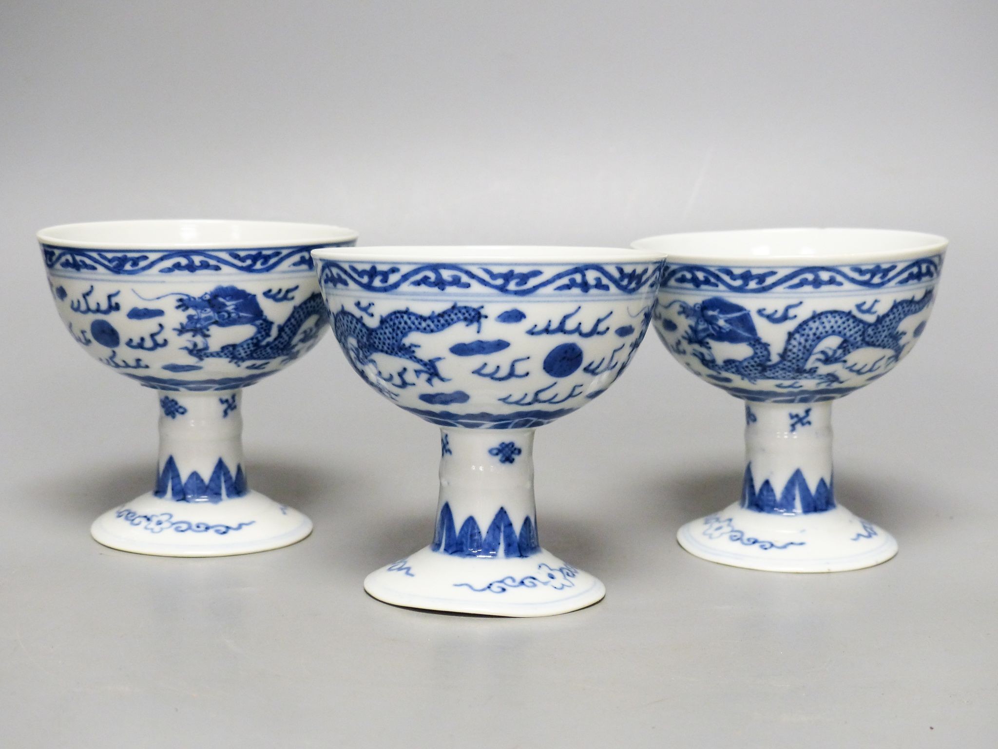 Three Chinese blue and white porcelain stem cups, c.1900, 9.5cm